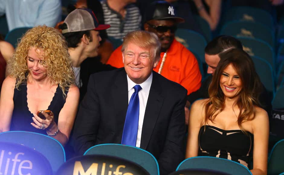 Las Vegas, NV, USA; Donald Trump (middle) and wife Melania Trump (right) in attendance before the welterweight boxing fight between Floyd Mayweather and Manny Pacquiao at the MGM Grand Garden Arena. Photo Credit: Mark J. Rebilas-USA TODAY Sports