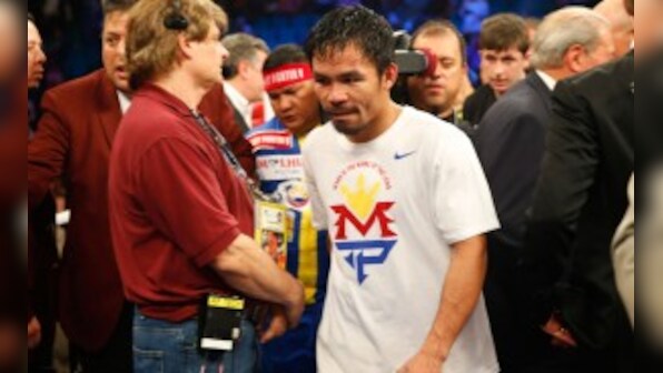 Manny Pacquiao says shoulder injury limited him in Floyd Mayweather loss 