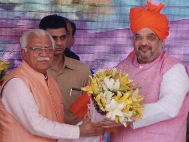BJP President Amit Shah with Haryana Chief Minister Manohar Lal Khattar in Karnal on Tuesday. PTI