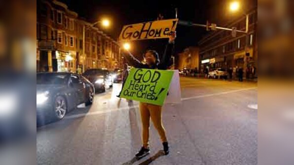 Baltimore heads into weekend of rallies after prosecutor charges officer for death of Freddie Gray