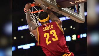 LeBron James fights off injury to lead Cleveland to 3-0 lead in Eastern Conference finals