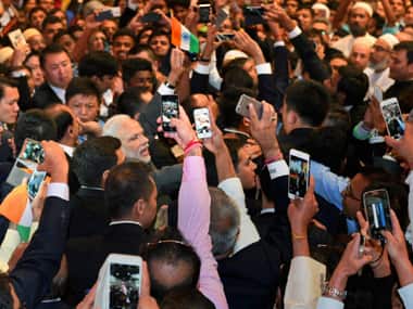PM Narendra Modi interacting with NRIs in Shanghai on Saturday. PTI