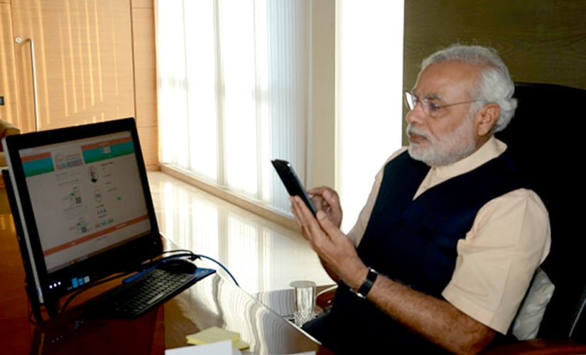 Image result for Narendra Modi using mobile phone