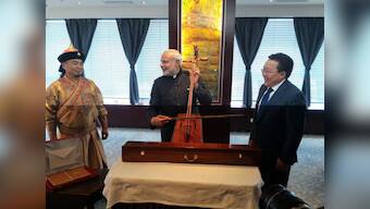 Mast bajaa rahaan hoon? After drums in Japan, Modi tries the morin khuur in Mongolia