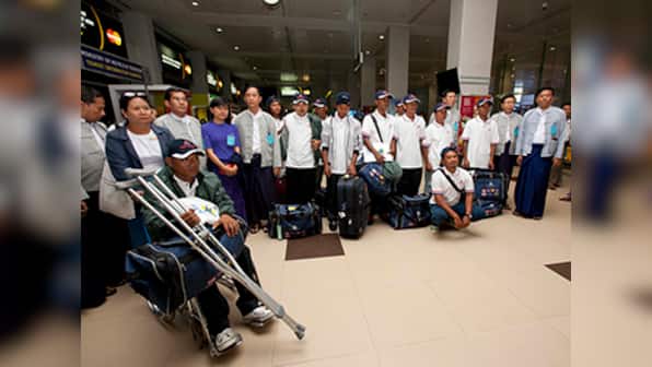 More than a hundred former slaves return home to Myanmar from Indonesia