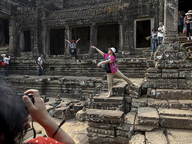 Wait, what? Tourists in court for cheeky nude snaps at Cambodia's Angkor temple Wait, what? Tourists in court for cheeky nude snaps at Cambodia's Angkor temple