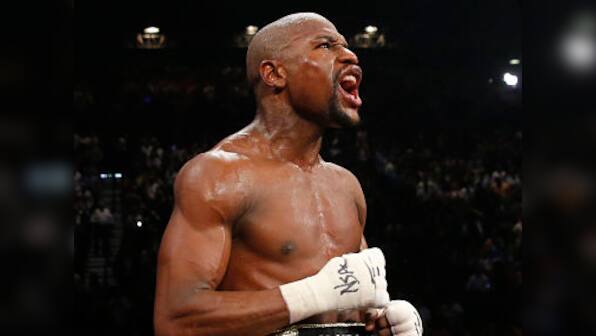 Mayweather cements his boxing legacy with easy win over Pacquiao
