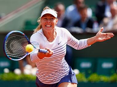 Maria Sharapova returns a shot during her Women's Singles match against Vitalia Diatchenko of Russia. Getty 