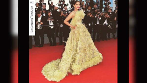 Is it a muppet? Is it a mop? No, it's Sonam Kapoor's Elie Saab gown at Cannes