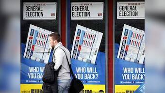 Polling begins in Britain elections, Labour's Miliband casts his vote