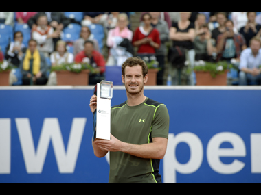 Andy Murray wins first clay-court title in Munich Andy Murray wins first clay-court title in Munich