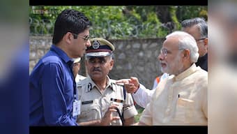 Mr Dabangg Collector: IAS officer gets warning for wearing glares while meeting Modi