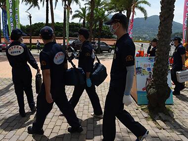 Cigarettes or spark suspected in Taiwan water park fire that burned 500