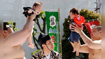 Bawl of a time: Tearful Japanese toddlers face off in annual 'crying sumo' competition