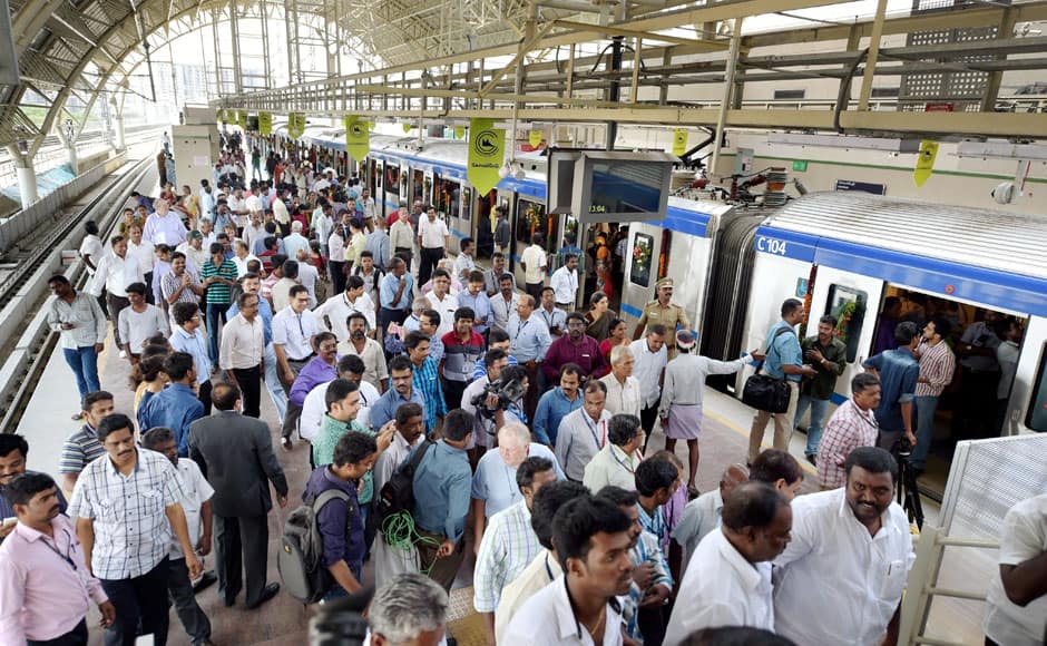 Chennai: People boarding a metro train after Tamil Nadu CM J Jayalalithaa flagged off the Chennai Metro Rail Limited's passenger services between Alandur and Koyambedu, in Chennai on Monday. PTI 
