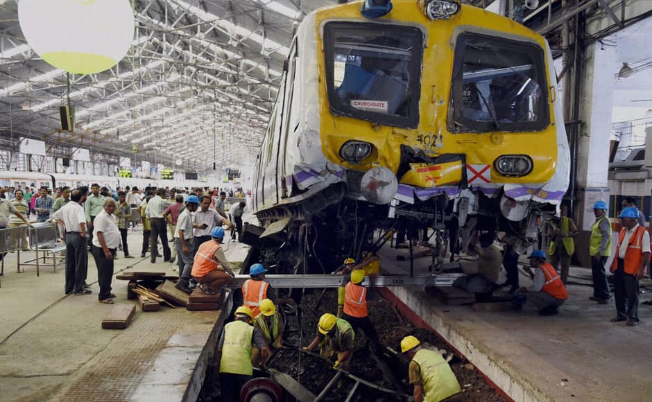 Mumbai: A Mumbai local train derails from the platform after the driver lost control at Churchgate station in Mumbai on Sunday. PTI 