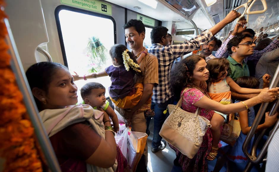 Chennai: People on board a metro train after Tamil Nadu CM J Jayalalithaa flagged off the Chennai Metro Rail Limited's passenger services between Alandur and Koyambedu through video conference, in Chennai on Monday. PTI 
