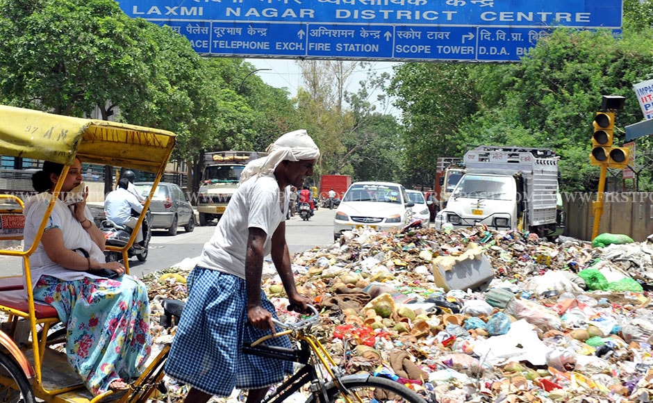 Delhi streets overflow with garbage as Rahul Gandhi meets striking ...