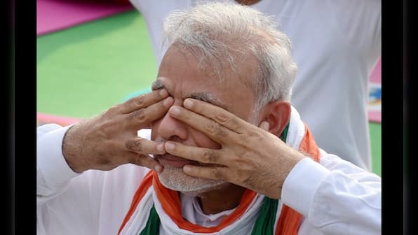 Just another day at the office: Modi does Yoga, thousands follow