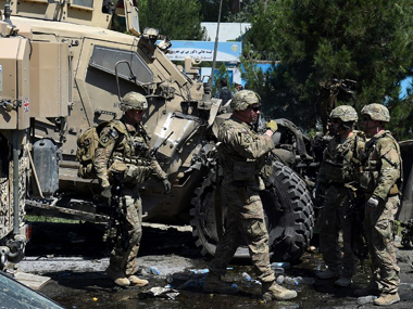 Two dead, 60 wounded in Kabul as Taliban attacks police headquarters, military convoy Two dead, 60 wounded in Kabul as Taliban attacks police headquarters, military convoy