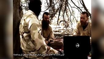 In a 19-minute video, al Qaeda jihadist parades western hostages