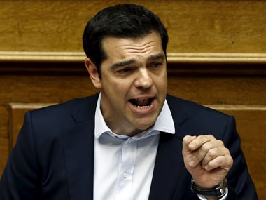Greece govt suffers defections as austerity vote looms