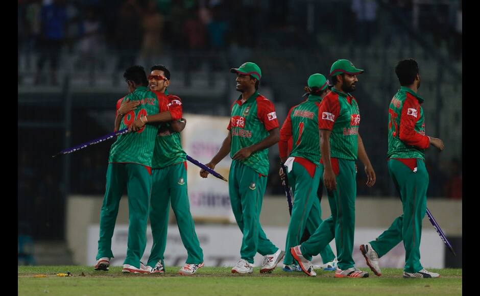 Bangladesh’s players celebrate their win over India during the first one-day international cricket match between them in Dhaka, Bangladesh, Thursday, June 18, 2015. Bangladesh won by 79 runs. (AP Photo/A.M. Ahad)