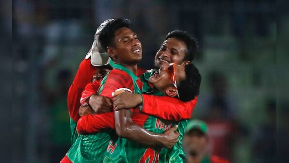 Riding on Mustafizur's five-for on debut Bangladesh celebrate a famous win over India