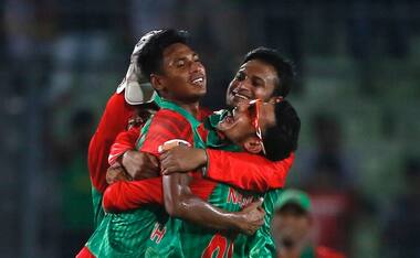 Riding on Mustafizur's five-for on debut Bangladesh celebrate a famous win over India