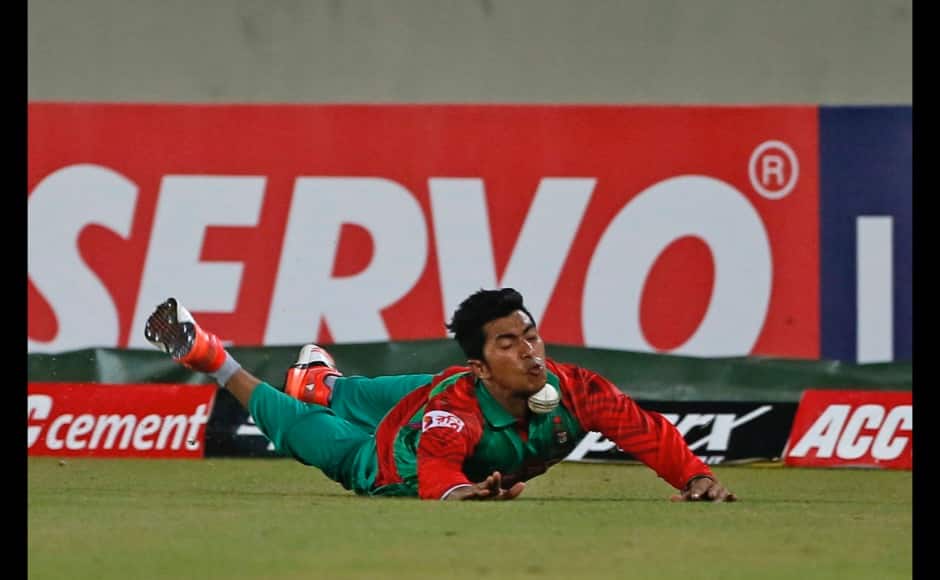 angladesh’s Soumya Sarkar dives to stop the ball as he fields against India during their first one-day international cricket match in Dhaka, Bangladesh, Thursday, June 18, 2015. (AP Photo/ A.M. Ahad) 