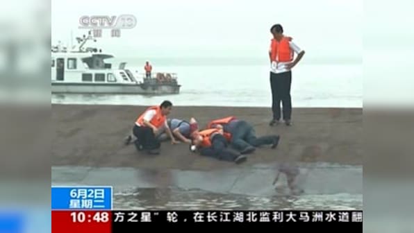 China to move capsized ship to search for eight missing bodies