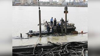 Two patrol boats sink following fire at Naval dockyard in Mumbai