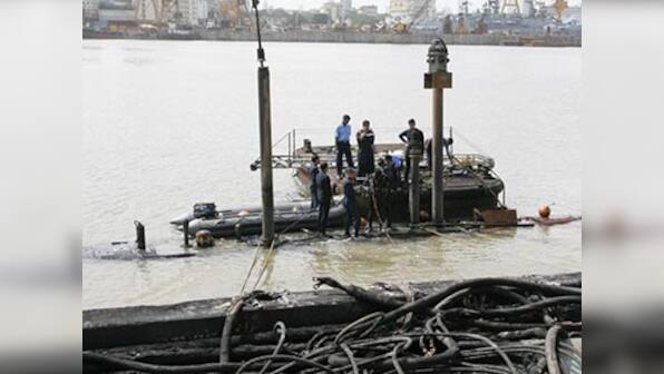 Two patrol boats sink following fire at Naval dockyard in Mumbai