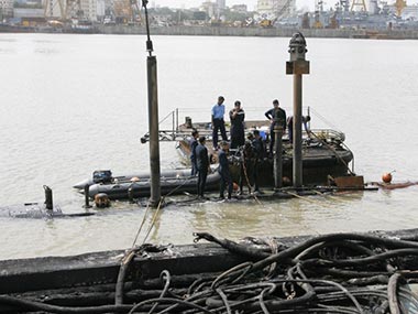 Two patrol boats sink following fire at Naval dockyard in Mumbai Two patrol boats sink following fire at Naval dockyard in Mumbai
