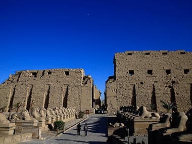 In this file photo tourists look out at the ruins of the Karnak Temple in Luxor, Egypt. AP