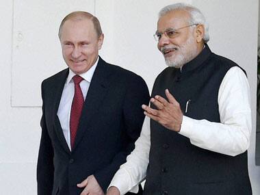 Modi with Putin. PTI 