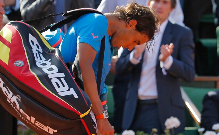 Photos: End of an era? Nadal's French Open run ends with meek loss to Djokovic 