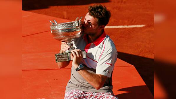 Inspired Wawrinka overpowers Djokovic to clinch maiden French Open title