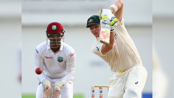 Steve Smith century puts Australia on top after early wobble at Kingston