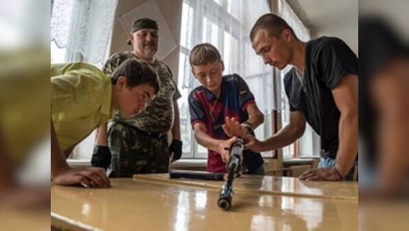 14-year-olds know how to assemble Kalashnikovs: Ukraine rebels train children to be soldiers 