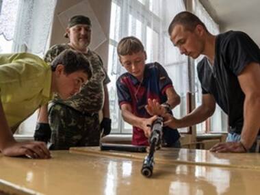 14-year-olds know how to assemble Kalashnikovs: Ukraine rebels train children to be soldiers 