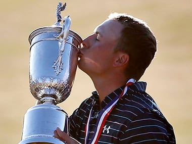 Jordan Spieth kisses the trophy after winning the the US Open golf tournament. AP