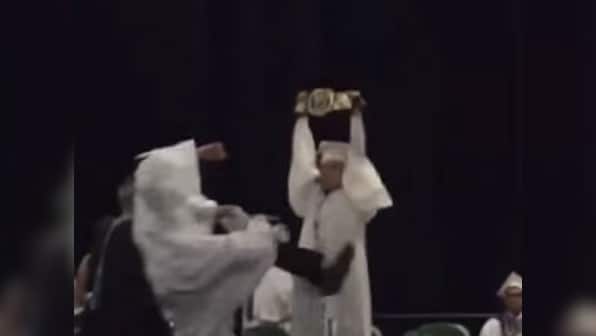 Watch: Celebrating your graduation? Two badass WWE fans show you how it's done