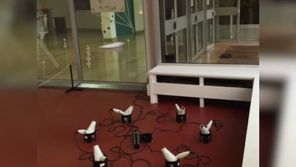 Watch: Artist uses hair dryers to create gravity-defying works of art
