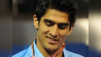 Boxer Vijender Singh turns pro, ends Olympic hopes