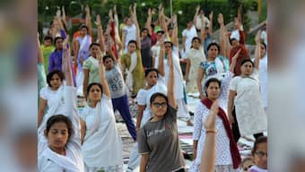 Thousands flock to Rajpath to rehearse 'asanas' for International Yoga Day