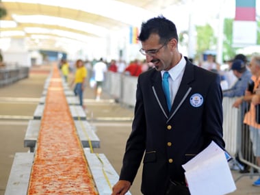 Italy sets Guinness World Record with the longest pizza – Firstpost