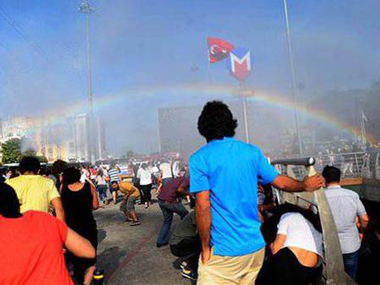 Turkey police hit gay pride parade with water cannons, end up creating a rainbow Turkey police hit gay pride parade with water cannons, end up creating a rainbow