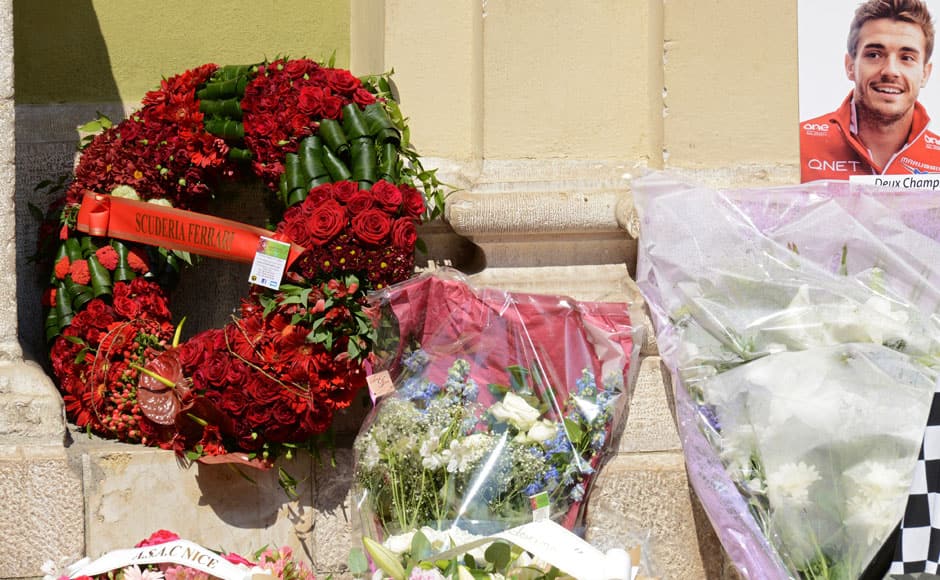 A wreath of red roses from Ferrari placed outside the cathedral at the funeral ceremony pay tribute to the late Marussia Formula 1 driver Jules Bianchi at the Sainte Reparate Cathedral in Nice, July 21, 2015. Bianchi, 25, died in hospital in Nice on Friday, nine months after his crash at Suzuka in Japan and without regaining consciousness. REUTERS