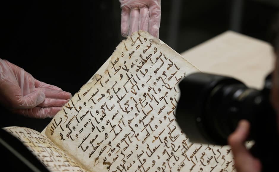 A fragment of a Koran manuscript is photographed in the library at the University of Birmingham in Britain July 22, 2015. A British university said on Wednesday that fragments of a Koran manuscript found in its library were from one of the oldest surviving copies of the Islamic text in the world, possibly written by someone who might have known Prophet Mohammad. Radiocarbon dating indicated that the parchment folios held by the University of Birmingham in central England were at least 1,370 years old, which would make them one of the earliest written forms of the Islamic holy book in existence. REUTERS